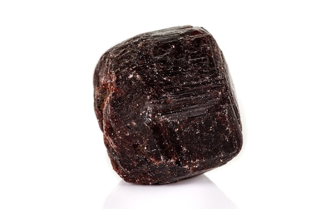 Macro mineral stone Garnet on a white background