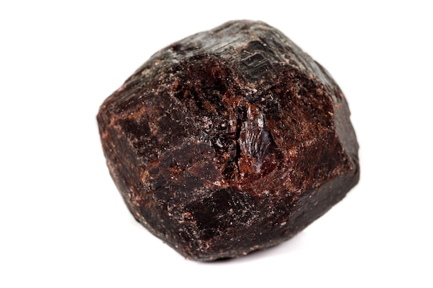 Macro mineral stone Garnet on a white background