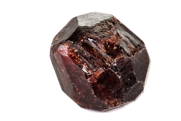 Macro mineral stone Garnet on a white background