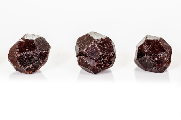 Macro mineral stone Garnet on a white background