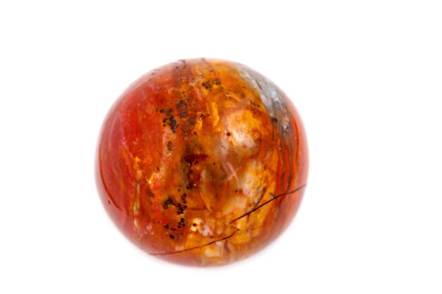 Photo macro mineral stone jasper ball on white background