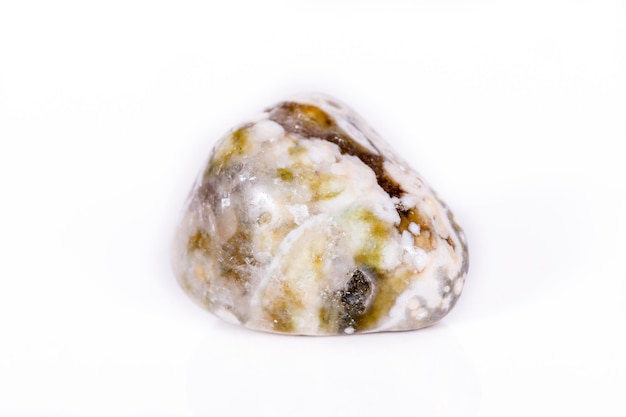 Macro mineral stone Jasper oceanic on a white background