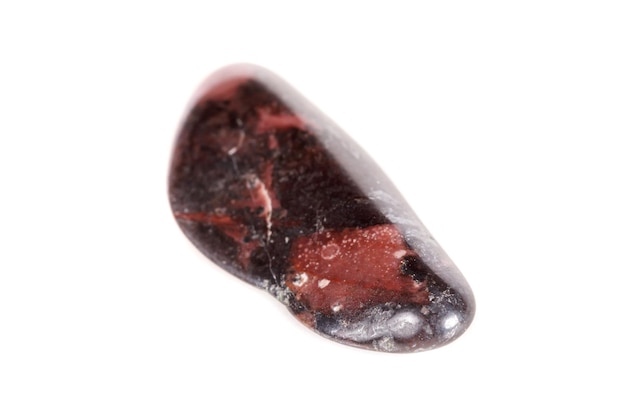 Macro mineral stone jasper on a white background