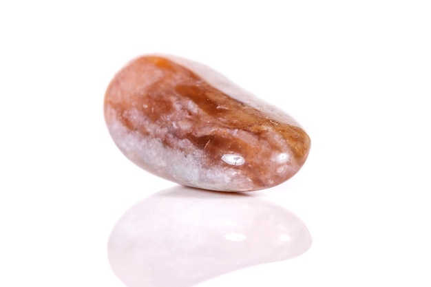 Macro mineral stone jasper on a white background