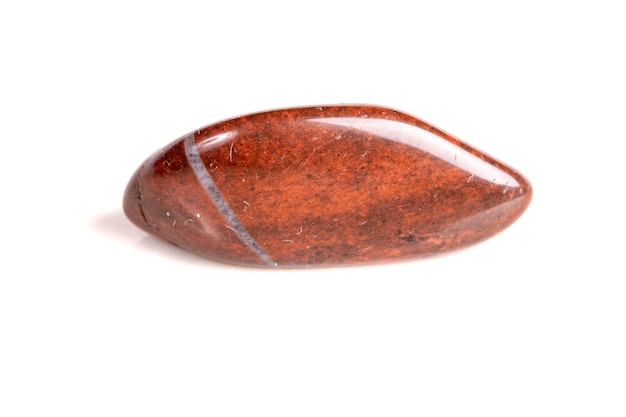 Macro mineral stone jasper on a white background