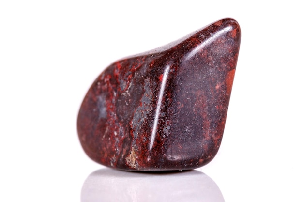 Macro mineral stone jasper on a white background