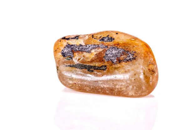 Macro mineral stone jasper on a white background