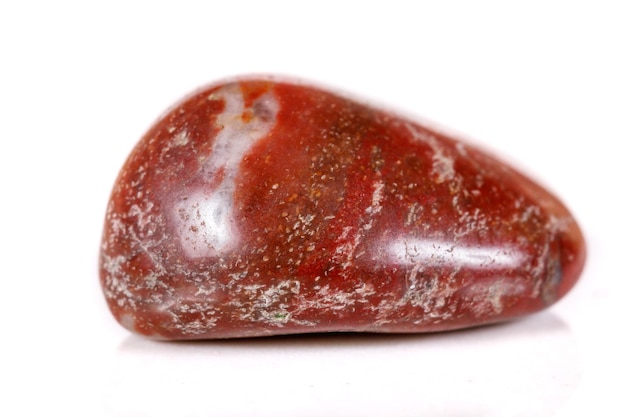 Macro mineral stone jasper on a white background