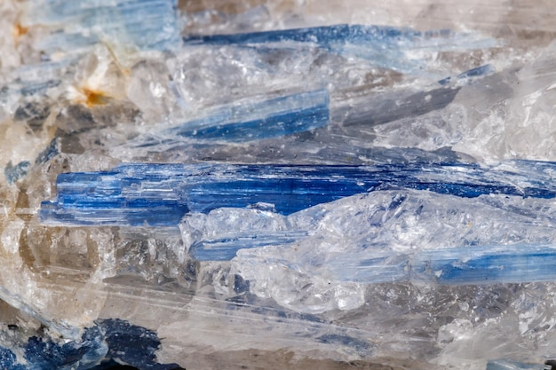 Macro mineral stone Kyanite a white background