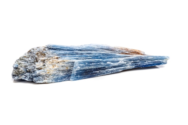 Macro mineral stone Kyanite a white background