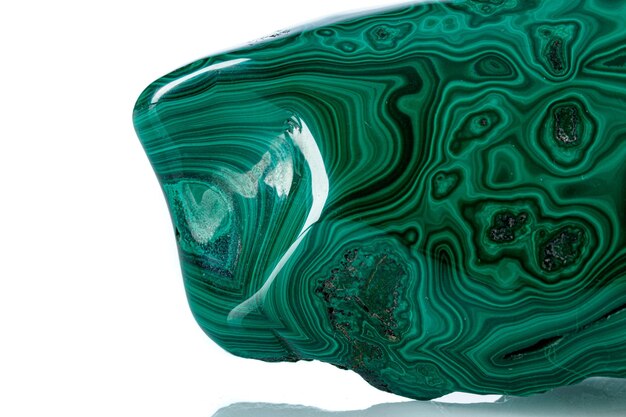 Macro mineral stone malachite on a white background