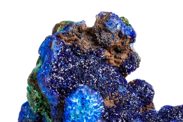 Macro mineral stone malachite with azurite on white background