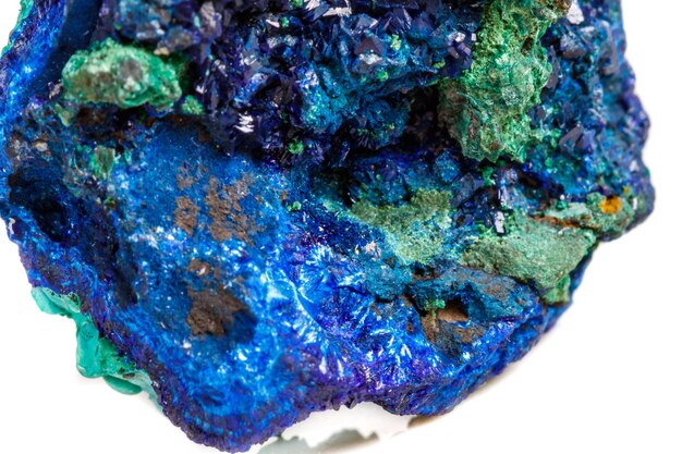 Macro mineral stone malachite with azurite on white background