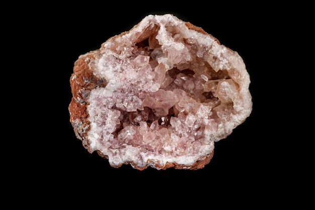 Macro mineral stone Pink Amethyst on a black background