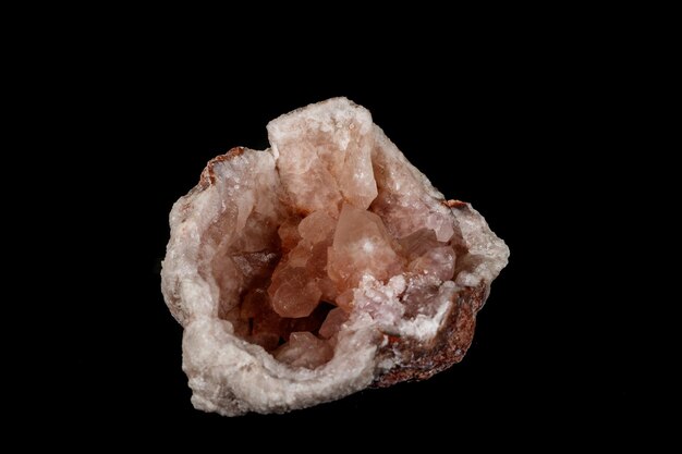 Macro mineral stone Pink Amethyst on a black background