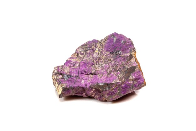 Macro mineral stone purpureus purple purpurite in the breed a white background