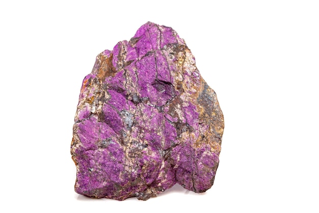 Macro mineral stone purpureus purple purpurite in the breed a white background