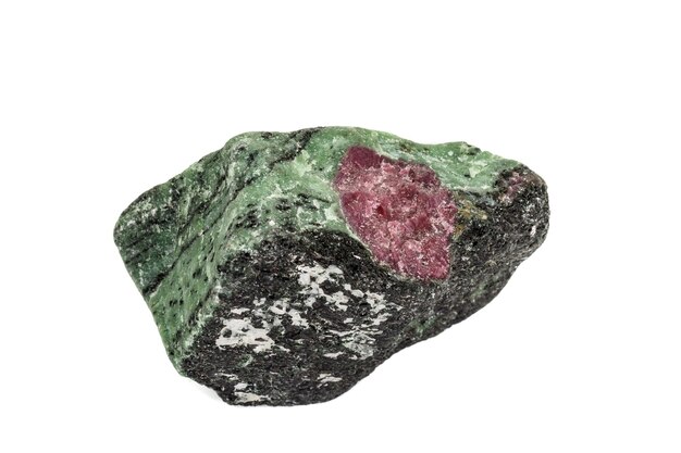 Macro of mineral stone ruby in rock on white background