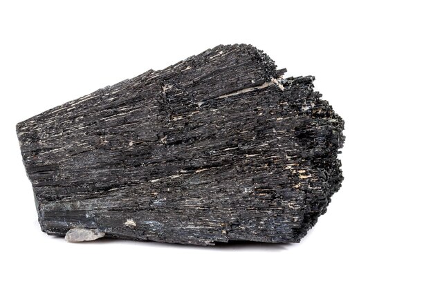 Macro mineral stone Schorl Black Tourmaline on a white background