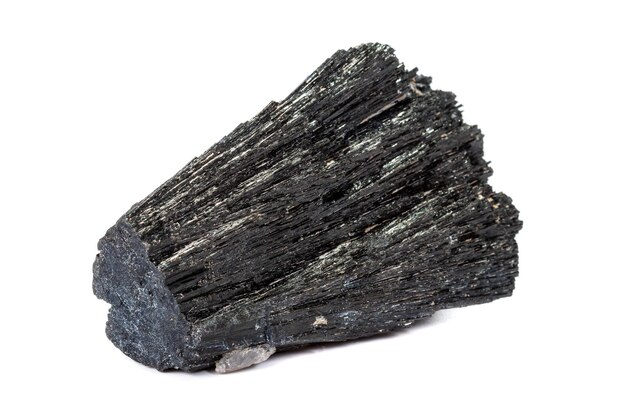 Macro mineral stone Schorl Black Tourmaline on a white background