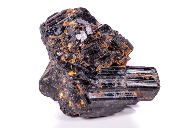 Macro mineral stone sherle schorl black tourmaline on white background