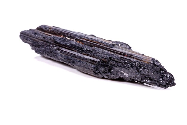 Macro mineral stone sherle schorl black tourmaline on white background