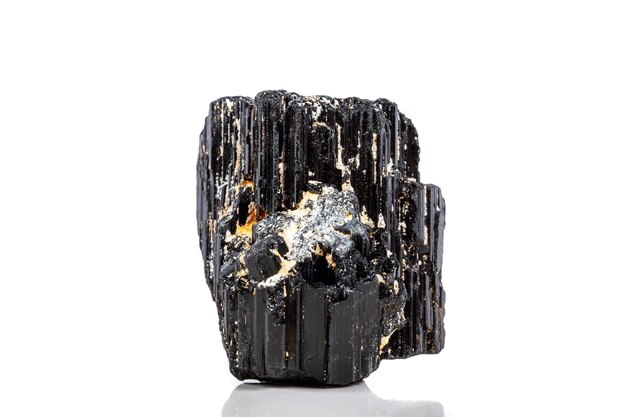 Macro mineral stone sherle schorl black tourmaline on white background