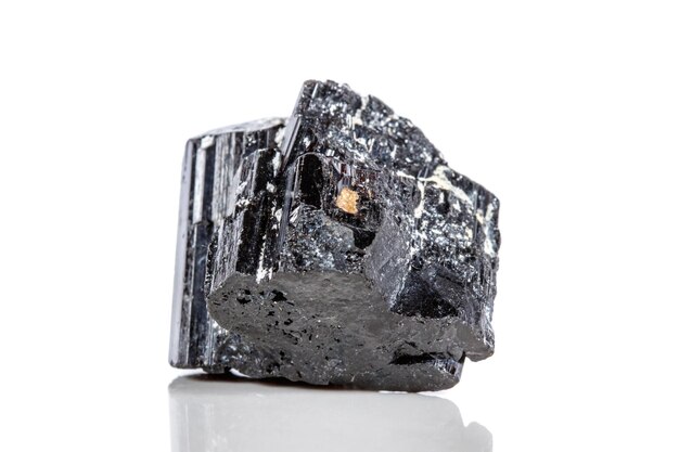 Macro mineral stone sherle schorl black tourmaline on white background