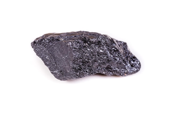 Macro mineral stone sorrel black tourmaline on white background