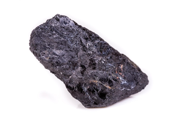 Macro mineral stone sorrel black tourmaline on white background