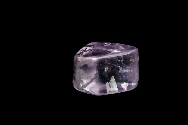 Macro mineral stone spodumene kunzite black background