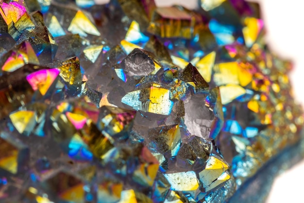 Macro mineral stone Titanium Quartz Flame Aura Quartz on a white background