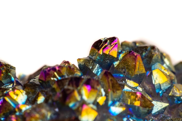 Photo macro mineral stone titanium quartz flame aura quartz on a white background