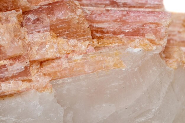 Macro mineral stone Tourmaline in the breed a white background