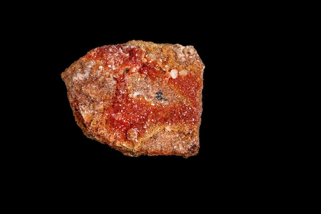 Macro mineral stone Vanadinite on a black background