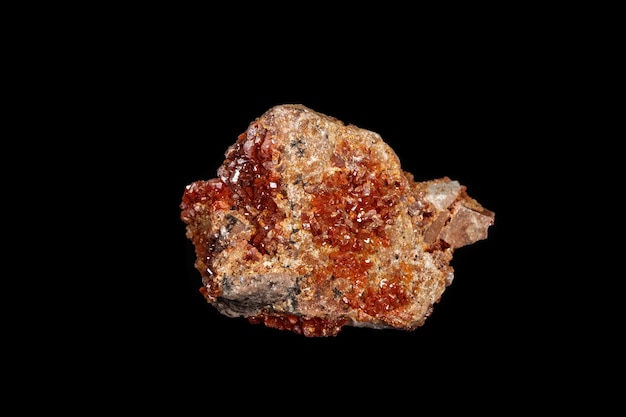 Macro mineral stone Vanadinite on a black background