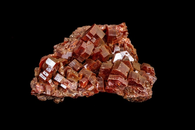 Macro mineral stone Vanadinite on a black background