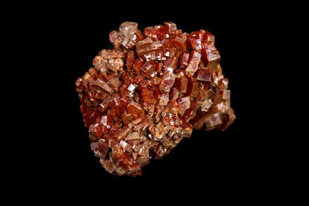 Macro mineral stone Vanadinite on a black background