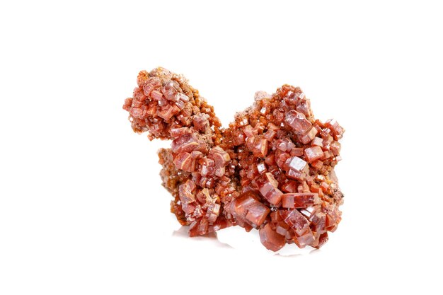 Macro mineral stone Vanadinite on a white background