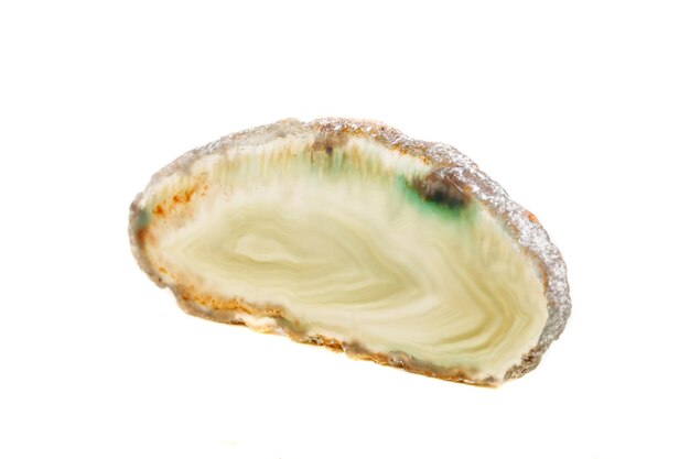 Macro mineral stone Yellow Agate breed a white background