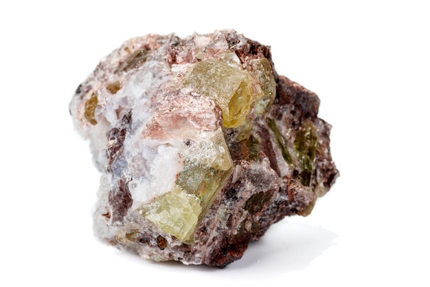 Macro mineral stonexAGolden Apatite on a white background