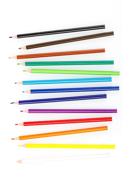 Macro multicolored pencils on a white background