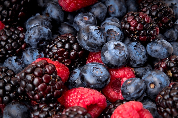 Macro photo blueberries, blackberries and raspberries