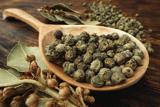 Macro photo of.green peppercorns on table