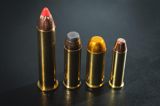 Photo macro photo magnum class cartridges for revolvers and pistols 4570 44 magnum 50ae 357 magnum