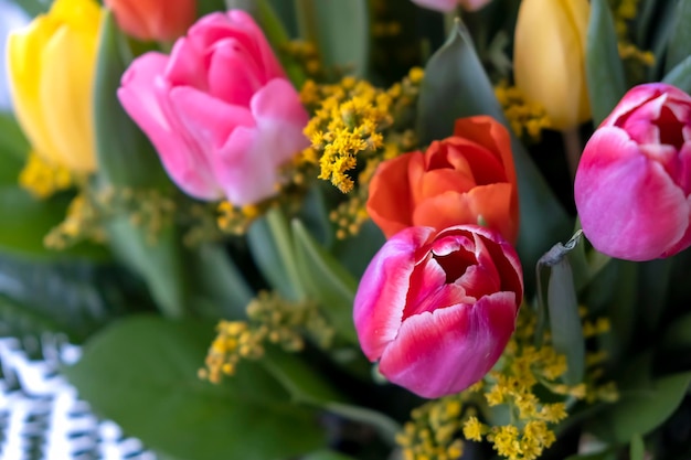 Macro photo Pink tulip Fresh multicolored tulip bouquet in a basket Romantic happy birthday concept