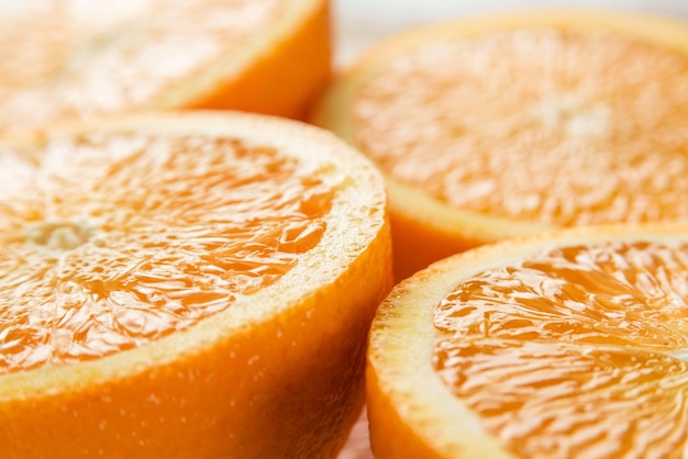 Macro photo with shallow depth of field slices of oranges closeup