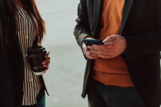 macro photo of young people using the phone during a break from work.free space