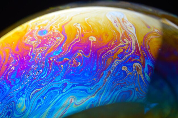 macro photograph of the surface of a soap bubble.