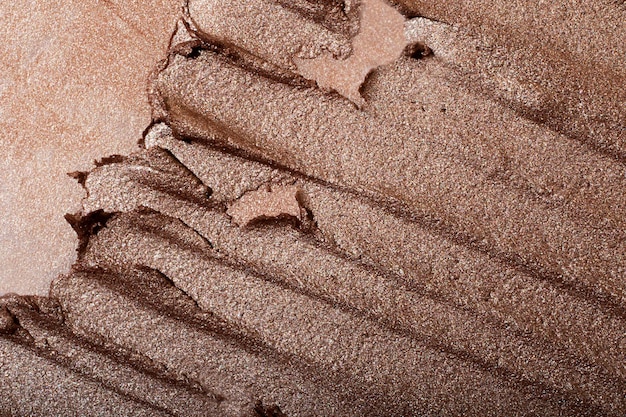 Macro photography of the cosmetic highlighter with shimer.Beautiful cosmetic background.